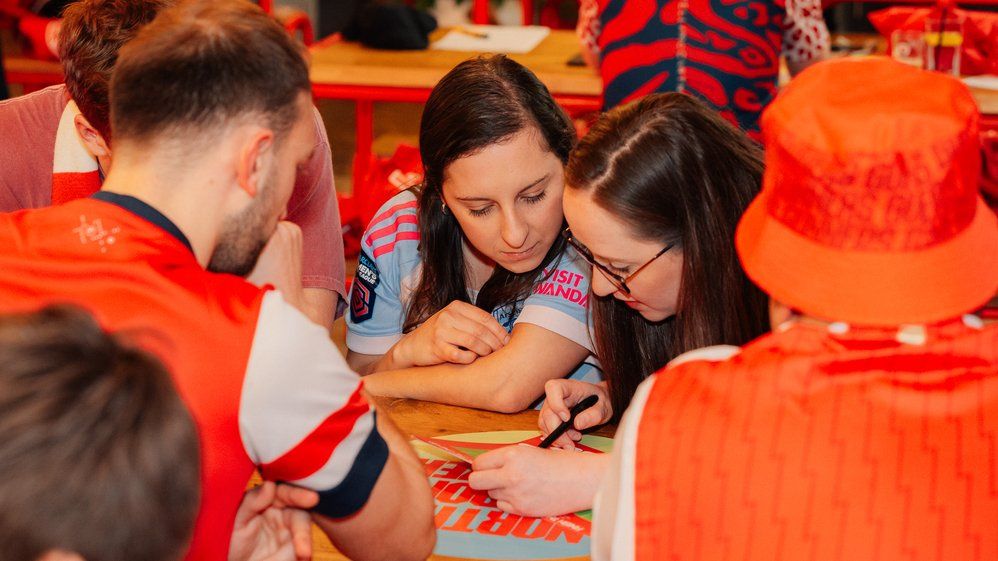 Members participating in a pub quiz at the Chelsea Women v Arsenal Women member screening