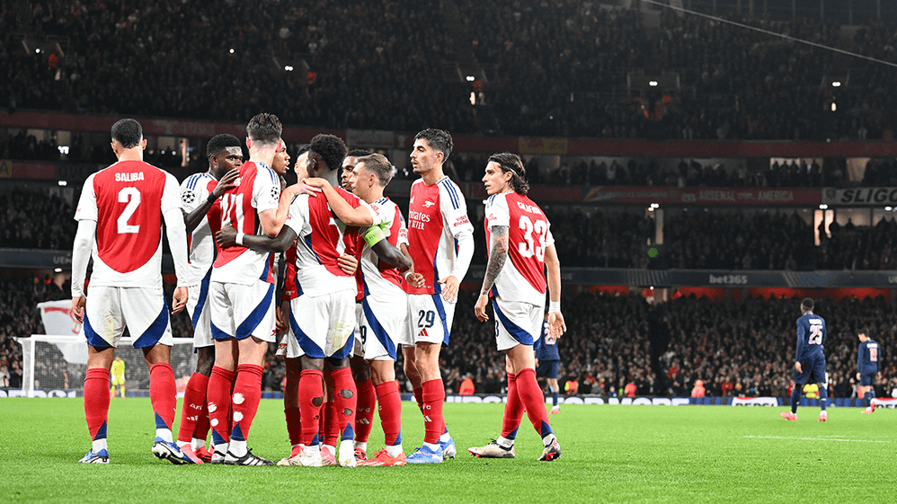 Arsenal celebrate scoring against PSG